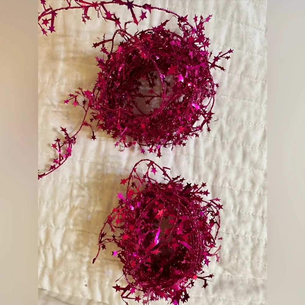 2 bundles of wired pink shimmery star garland - each about 25 feet long